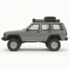 jeep cherokee xj mn78 auto rc escala 1-12 sobre fondo blanco o montañoso