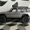 jeep cherokee xj mn78 auto rc escala 1-12 sobre fondo blanco o montañoso