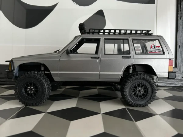 jeep cherokee xj mn78 auto rc escala 1-12 sobre fondo blanco o montañoso