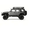 jeep rubicon mn128 auto rc escala 1-12 en fondo natural o sobre terreno rocoso