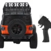 jeep rubicon mn128 auto rc escala 1-12 en fondo natural o sobre terreno rocoso