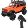 jeep rubicon mn128 auto rc escala 1-12 en fondo natural o sobre terreno rocoso