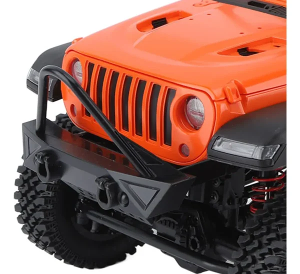 jeep rubicon mn128 auto rc escala 1-12 en fondo natural o sobre terreno rocoso