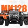 jeep rubicon mn128 auto rc escala 1-12 en fondo natural o sobre terreno rocoso