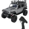 jeep rubicon mn128 auto rc escala 1-12 en fondo natural o sobre terreno rocoso