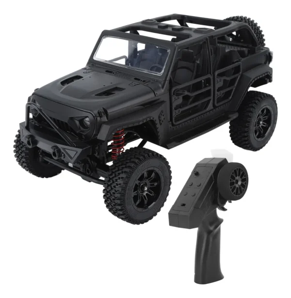 jeep rubicon mn128 auto rc escala 1-12 en fondo natural o sobre terreno rocoso