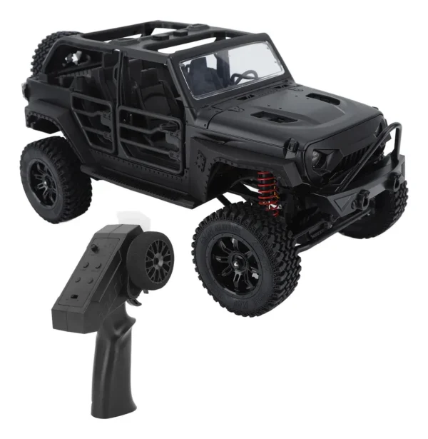 jeep rubicon mn128 auto rc escala 1-12 en fondo natural o sobre terreno rocoso