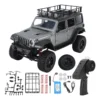 jeep rubicon mn128 auto rc escala 1-12 en fondo natural o sobre terreno rocoso
