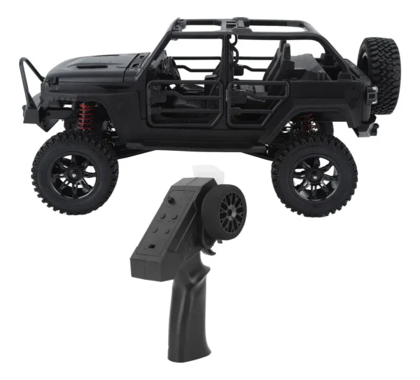 jeep rubicon mn128 auto rc escala 1-12 en fondo natural o sobre terreno rocoso