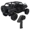 jeep rubicon mn128 auto rc escala 1-12 en fondo natural o sobre terreno rocoso