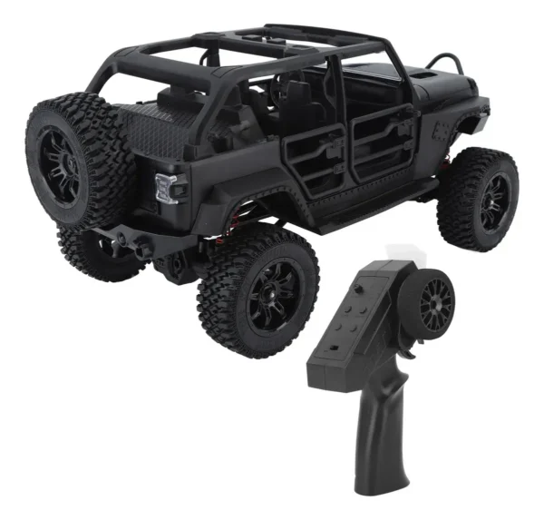 jeep rubicon mn128 auto rc escala 1-12 en fondo natural o sobre terreno rocoso