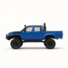toyota hilux 96 wpl c64 auto rc escala 1-16 sobre superficie rocosa o fondo blanco